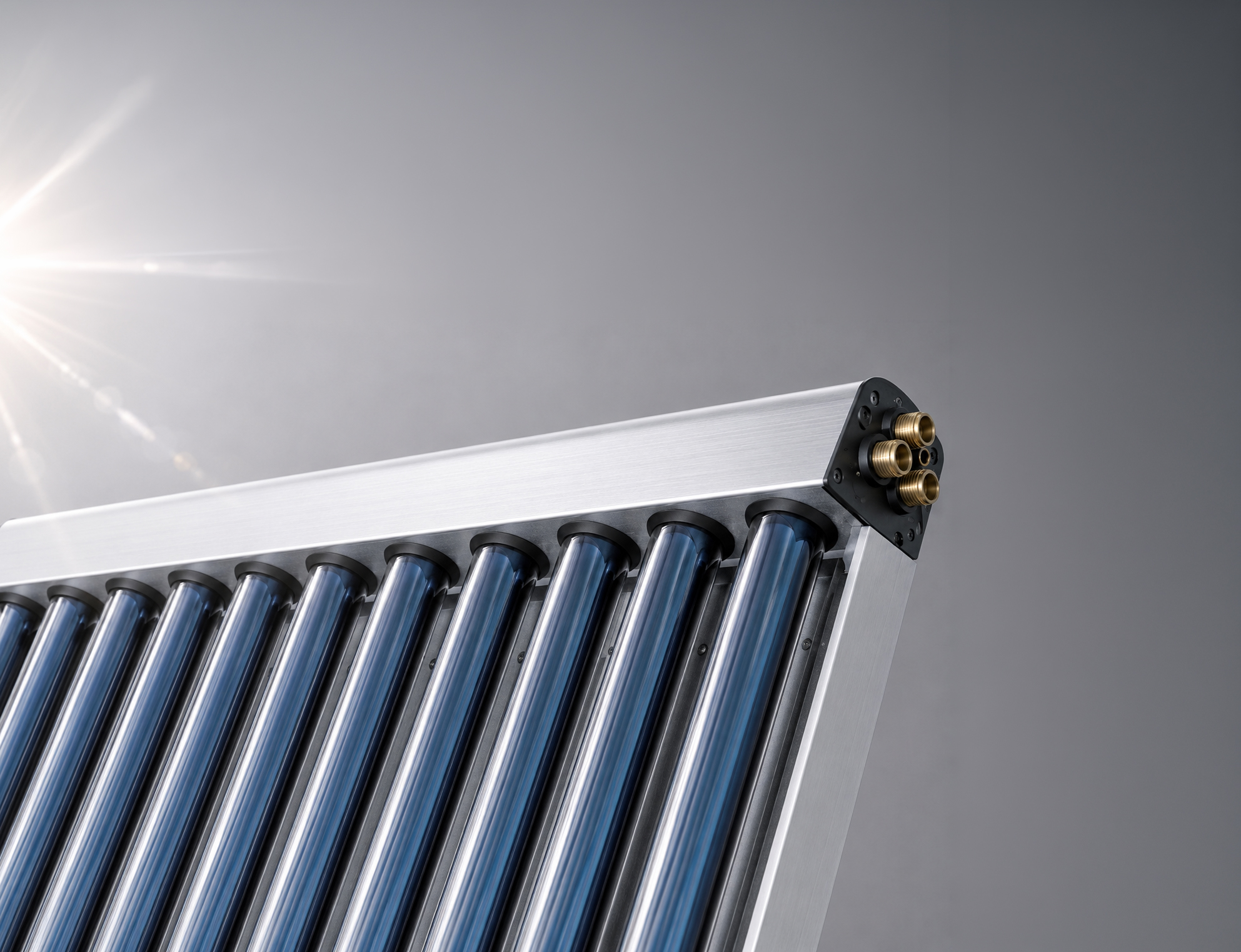 BANNER XRAY GRANDE - Pleion Shiny solar collector with blue vacuum tubes in a metal frame under bright sunlight on the left side of the image.