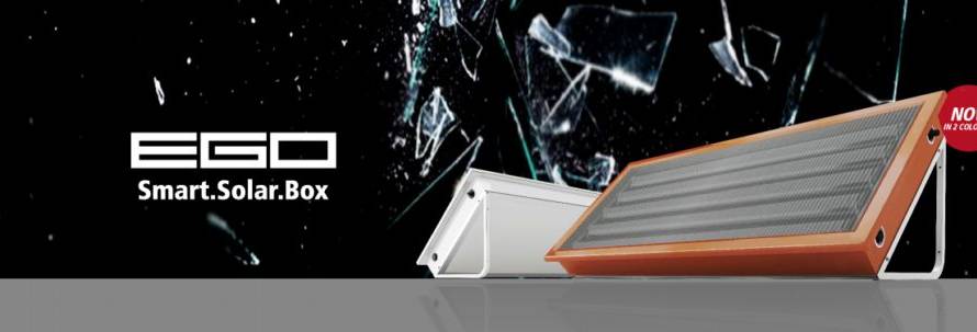 EGO Smart.Solar.Box advertisement showing two solar panels on a reflective gray surface with a shattered-glass background and the logo.